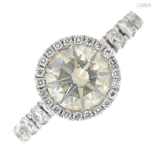 An 18ct gold synthetic diamond and diamond cluster ring.Synthetic diamond estimated weight 1.50cts,