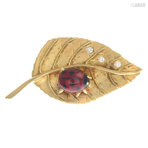 An 18ct gold diamond and enamel ladybird leaf brooch,