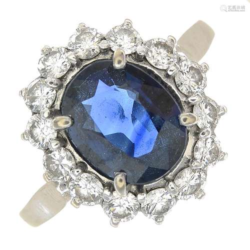 A sapphire and diamond cluster ring.Calculated sapphire weight 1.40cts,