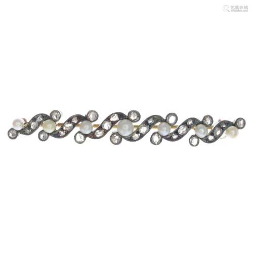 A seed pearl and diamond bar brooch.Approximate dimensions of seed pearls 3 to 4mms.Length 5.8cms.