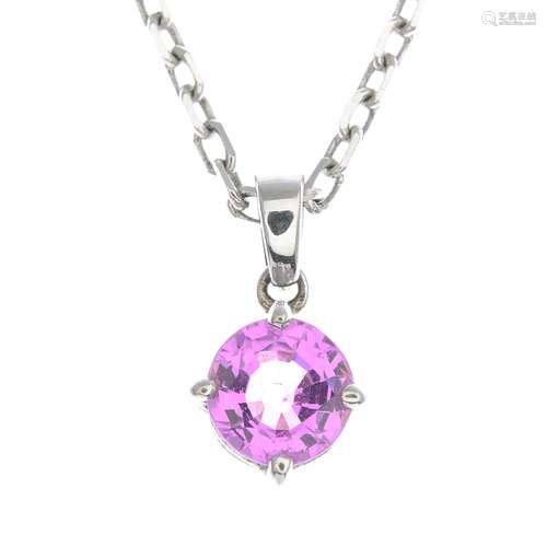 An 18ct gold pink sapphire pendant, suspended from an 18ct gold cable-link chain.