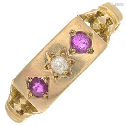 An Edwardian 15ct gold ruby and diamond three-stone ring.Hallmarks for Birmingham,