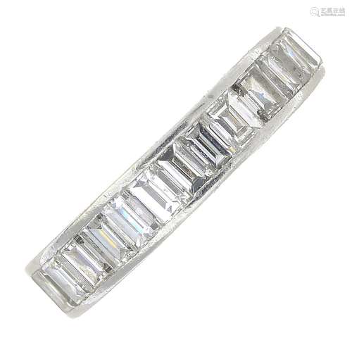 A baguette-cut diamond full eternity ring.Estimated total diamond weight 2cts,