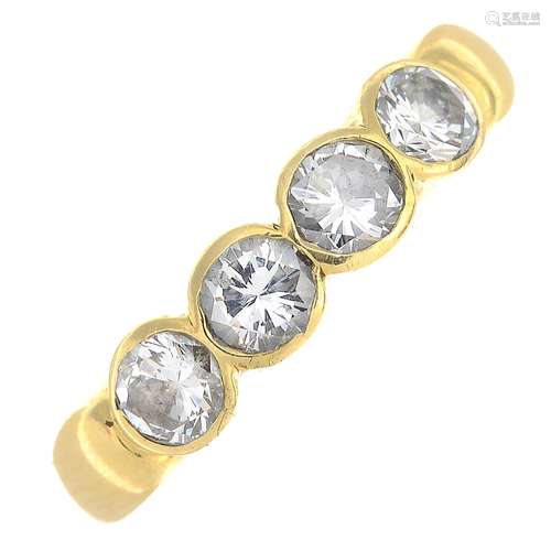 An 18ct gold brilliant-cut diamond ring.Estimated total diamond weight 0.60ct,