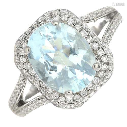 An 18ct gold aquamarine and diamond dress ring.