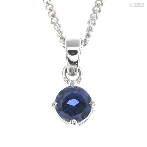 An 18ct gold sapphire pendant,