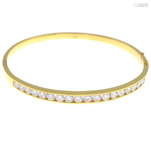 A diamond hinged bangle.Estimated total diamond weight 1.80cts,