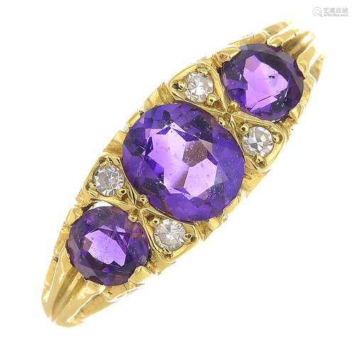 An 18ct gold amethyst and diamond ring.Estimated total diamond weight 0.10ct.Hallmarks for