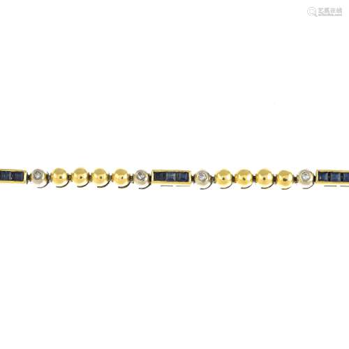An 18ct gold sapphire and diamond bracelet.AF.Hallmarks for Birmingham.Length 19.3cms.