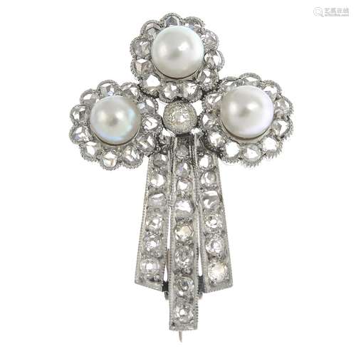 A diamond and cultured pearl brooch.