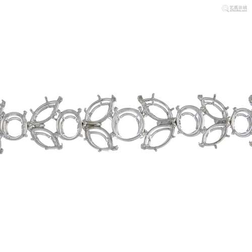 A diamond-set bracelet mount.Estimated total diamond weight 0.40ct.Length 16cms.