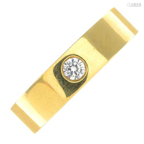 An 18ct gold diamond band ring.Estimated total diamond weight 0.20ct,