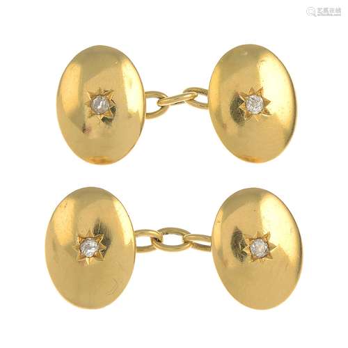 A pair of early 20th century 18ct gold old-cut diamond cufflinks.Estimated total diamond weight