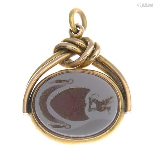 An early 20th century bloodstone and carnelian swivel locket fob.