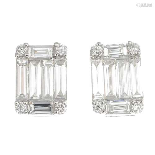 A pair of 18ct gold diamond cluster earrings.Total diamond weight 0.54ct,