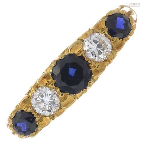 An 18ct gold sapphire and diamond five-stone ring.Estimated total diamond weight 0.30ct,