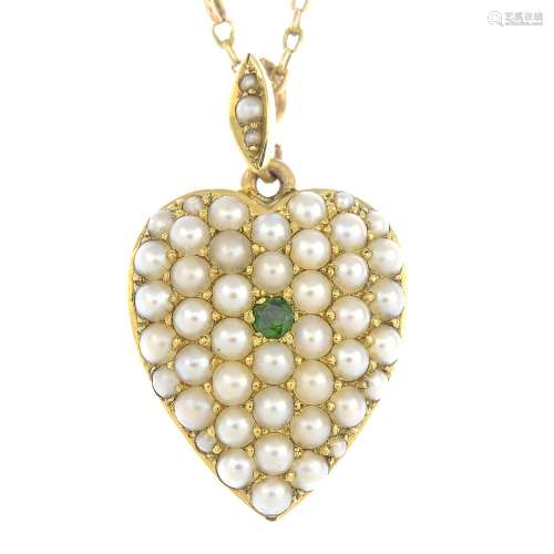 An early 20th century 9ct gold split pearl and emerald pendant,