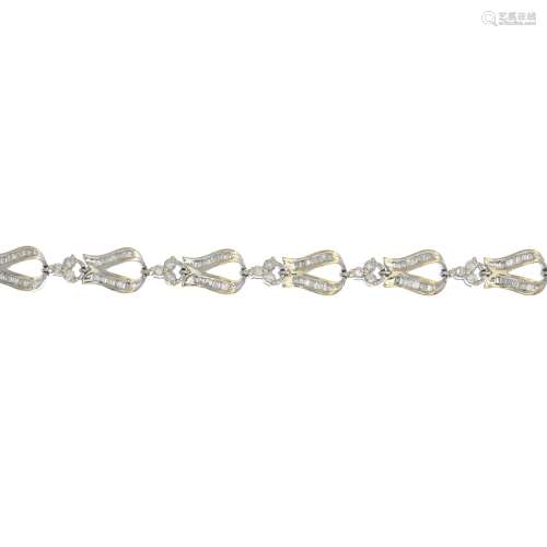 A diamond bracelet.Estimated total diamond weight 1.25 to 1.50cts.Stamped 750.Length 18cms.