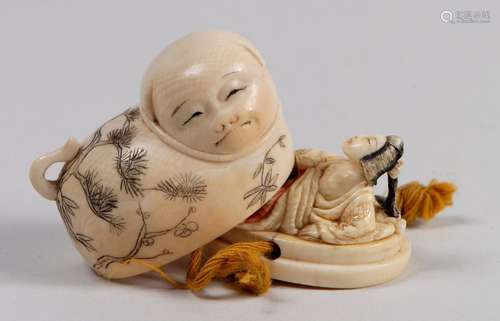 Netsuke en ivoire rehaussé de brun et de polychrom…