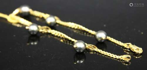 14KT ITALIAN MADE ANKLET WITH (5) BLACK BEADS