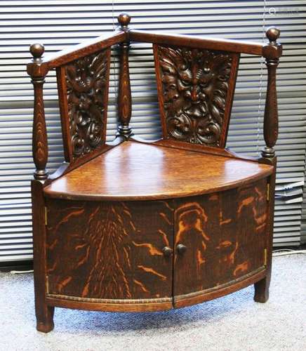 AMERICAN CARVED OAK CORNER CHAIR W/NORTHWIND FACE