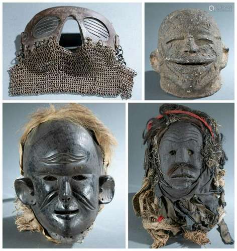 4 African Masks. 20th c.