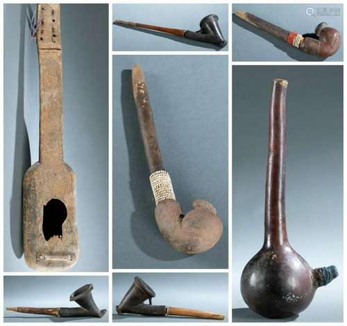 7 Ethnographic Pipes & Lutes. 20th c.