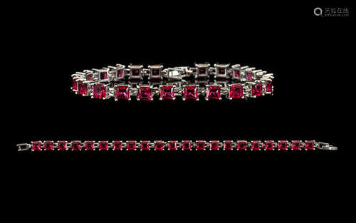 Ruby Tennis Bracelet, 21 Princess cut rubies of rich, glowing red, each measuring just over 1ct,