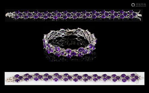 Amethyst Silver Statement Bracelet. Solid silver bracelet Set with 39 Amethyst, 20 plus ct, has 2