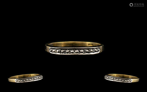 18ct Gold Half Eternity Ring set with round cut diamonds. Stamped 750. Ring size O.5