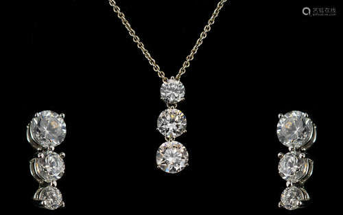 Silver & CZ Three Stone Pendant and Matching Earrings. Attractive set of a three stone CZ pendant on