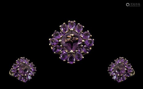 Amethyst Cluster Ring, a square cut amethyst of 2cts, set on the diagonal, with three pear cut