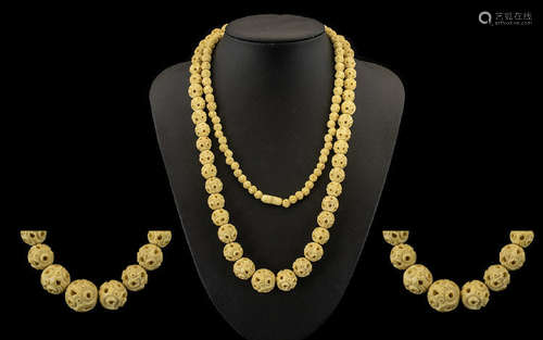 A Carved Bone Graduated Bead Necklace, early 20thC and beads ranging from 6 mm to 14 mm. The