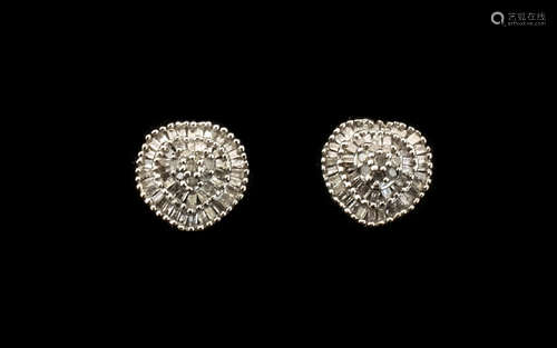 Diamond Cluster Earrings, .5ct; each having a raised centre of round cut diamonds framed by two,