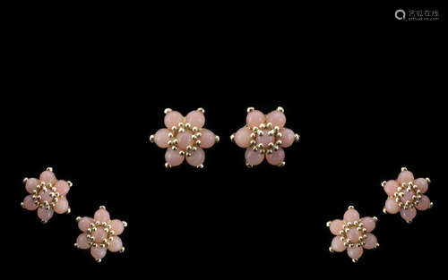 Pink Opal Flower Cluster Earrings, each earring comprising seven round cut pink opals, set in