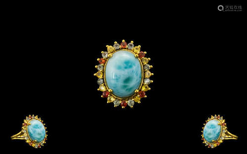 Larimar and Green, Yellow and Sunset Sapphire Ring, a 10ct cabochon of the natural, opaque,