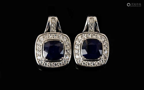 Sapphire and Natural White Zircon Drop Earrings, with ruby accents; each earring comprising a square