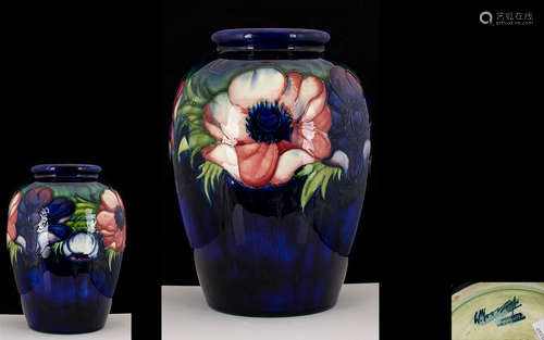 William Moorcroft Signed Tubelined Oviod Shaped Vase 'Anemone' Pattern, various colours of