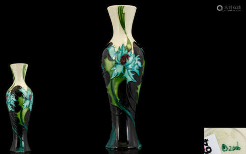 Moorcroft - Modern Slim fold Tube lined Bud Vase ' Sea Holly ' Design. Date 2006. Designer Emma