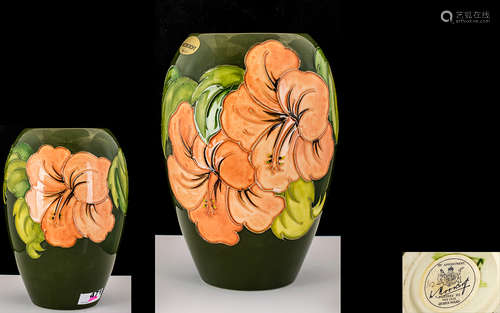 William Moorcroft Signed Tube lined Vase. c.1940's. Coral Hibiscus On Green Ground. Label to Base