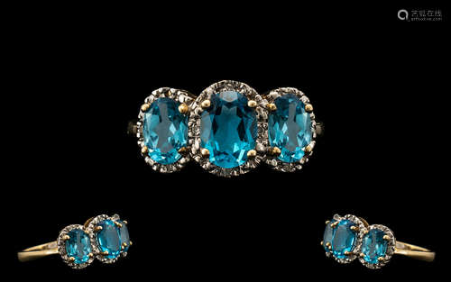 Ladies 9ct Gold Attractive 3 Stone Blue Topaz and Diamond Set Dress Ring - the blue topaz's of