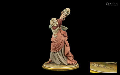 Capo-di-Monte Figure of a Lady in Late19thC Dress, signed B.Merli; the tall, elegant figure