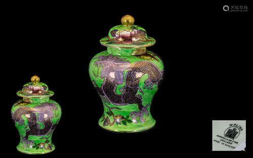 A Maling Lustre Ware Glazed Ginger Jar Decorated to the exterior with a single dragon amongst