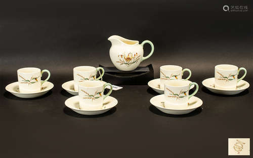 A Wedgwood Creamware Set of Coffee Canister and Saucers Tiger Lily Pattern c1950's plus milk jug.