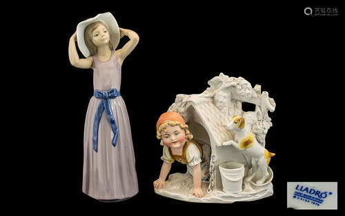 Lladro Figurine model no 5011, 'Trying On A Straw Hat' measuring 12 inches in height. Together