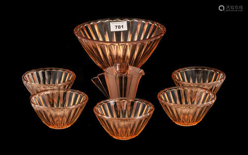 A Glass Art Deco Dessert Set comprising of a bowl and 6 dishes. Together with a cream jug.