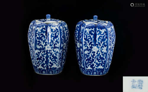 Pair Of Chinese Blue And White Lidded Jars. Typical decoration, character marks to under side,