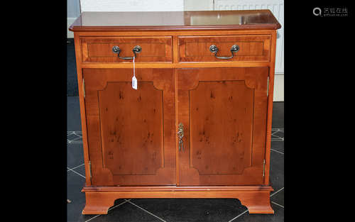 20th Century Yew Wood Small Sideboard with two short drawers and storage beneath. Measures 30'' tall