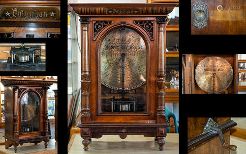 A 19th Century Coin Operated Penny-in-the-Slot Walnut Polyphon, by Nicole Freres, Leipzig, the