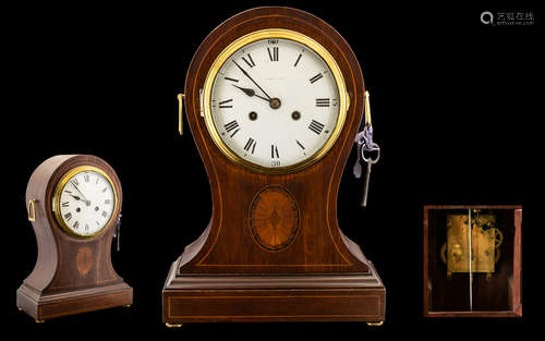 English 19th Century Impressive and Tall Mahogany and Inlaid Cased Mantel Clock of Waisted Form.